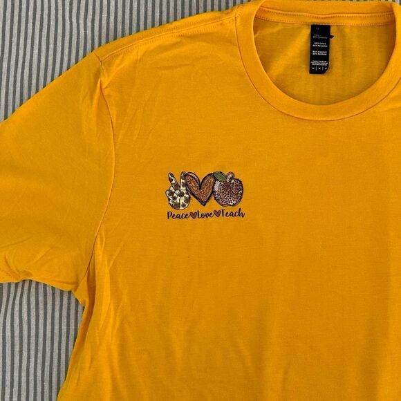 Peace Love Teach Yellow Logo Short Sleeve Tee Size Medium NWOT - Picture 1 of 2